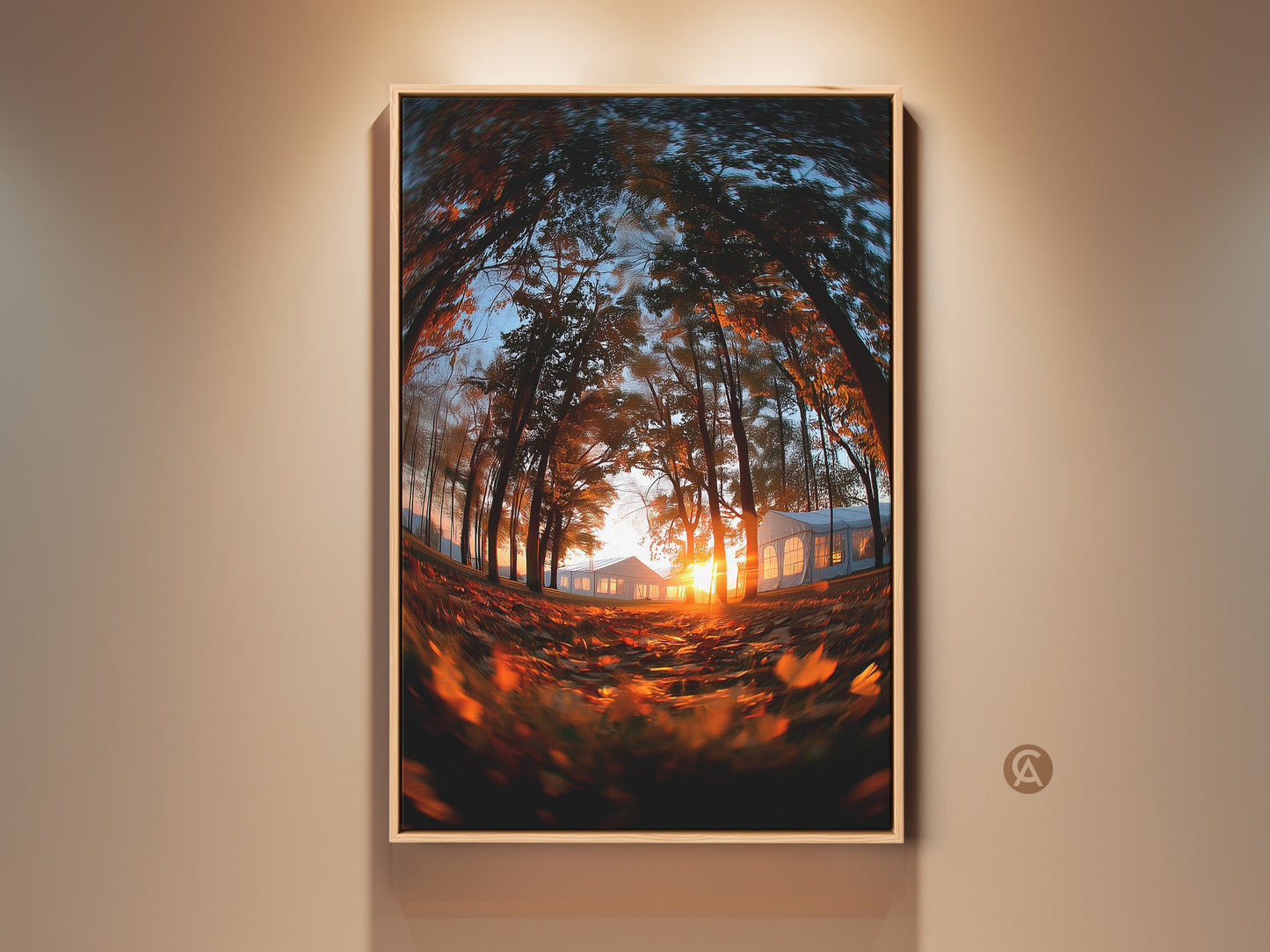 Framed nature artwork featuring a forest scene at sunset. The sun glows behind distant tents. The trees are in full autumn color. This art piece is perfect for nature lovers. Enhance your home decor with this framed artwork.