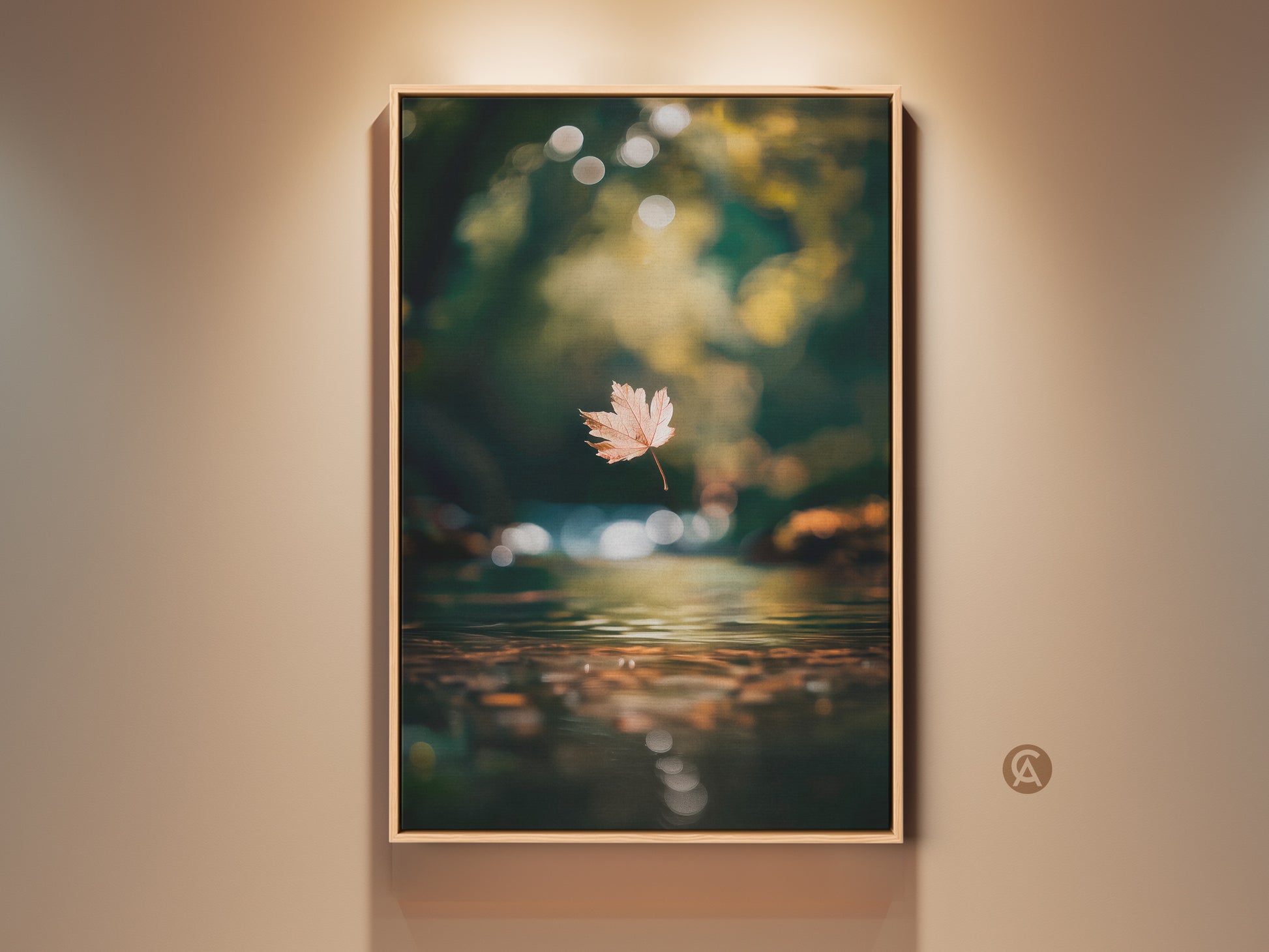 Experience nature's beauty with this framed artwork. A serene autumn scene features a floating leaf above calm water. The warm bokeh background adds depth to this tranquil nature art piece. Perfect for adding a touch of peace to any room get yours today.