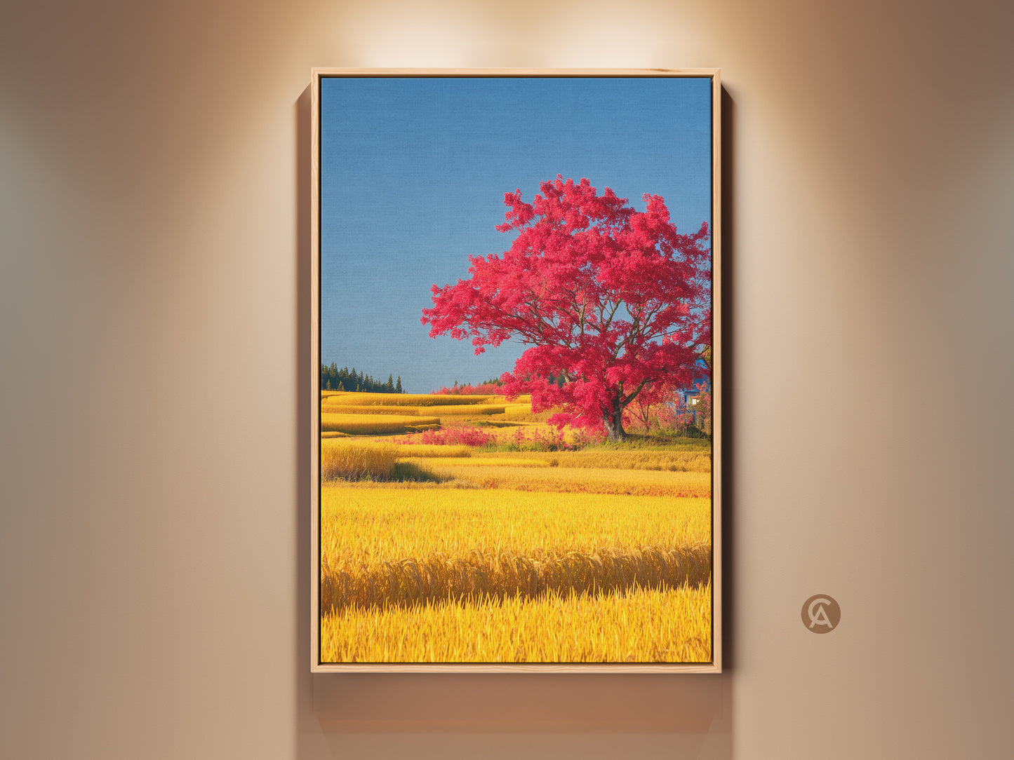 Framed yellow rice field wall art featuring a vibrant red tree and a clear blue sky. This scenic landscape is perfect for nature decor. It adds an eclectic touch to any home and serves as a thoughtful countryside artwork gift. The art piece enhances any room with its colorful and serene ambiance.