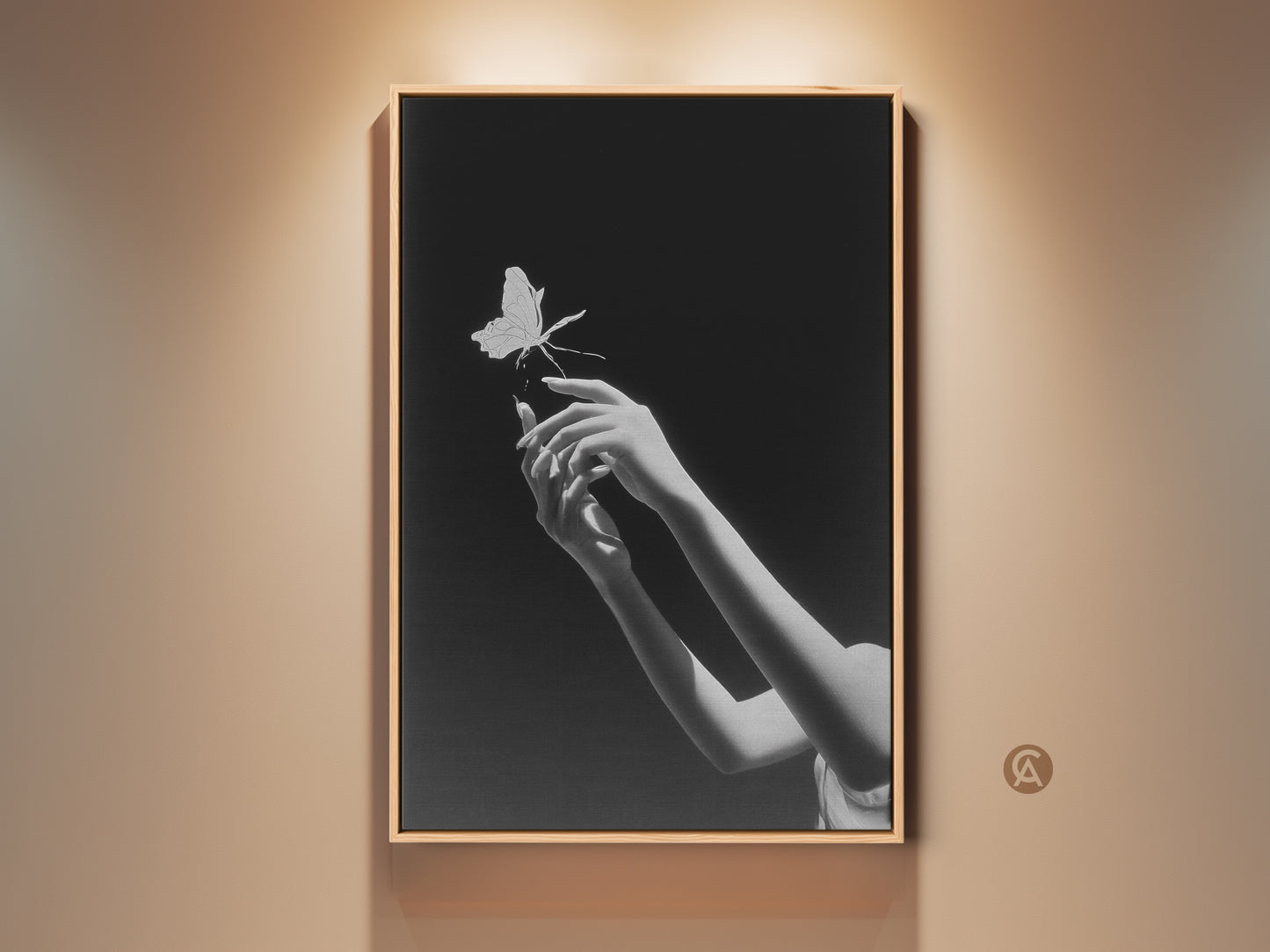 Elegant black and white art print featuring surreal hands reaching for a butterfly. This contemporary bedroom wall art adds a touch of symbolic nature to any modern home. It is a perfect gift for artists seeking minimalist and surreal wall decor. A fine art canvas print will bring an elegant aesthetic to your living space.