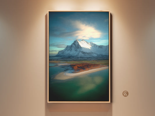 Framed coastal village snowy mountain canvas art print. This photorealistic scenic landscape wall art features blue teal bedroom decor. A unique housewarming gift for travel and nature lovers.