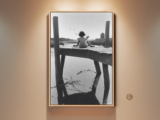 Vintage black and white photography. A girl sits on a dock looking out to the water. Evokes nostalgia and peace. Perfect coastal living room art or beach house decor. A summer beach photography print for a nostalgic soul.
