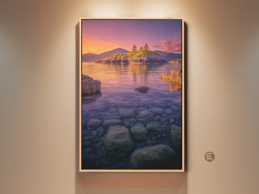 Island Seascape Canvas Print framed in a floating frame. This Coastal Sunset Wall Art features an orange and pink sky. The ocean landscape photography captures a serene island with trees. Perfect bedroom decor or a thoughtful housewarming gift.
