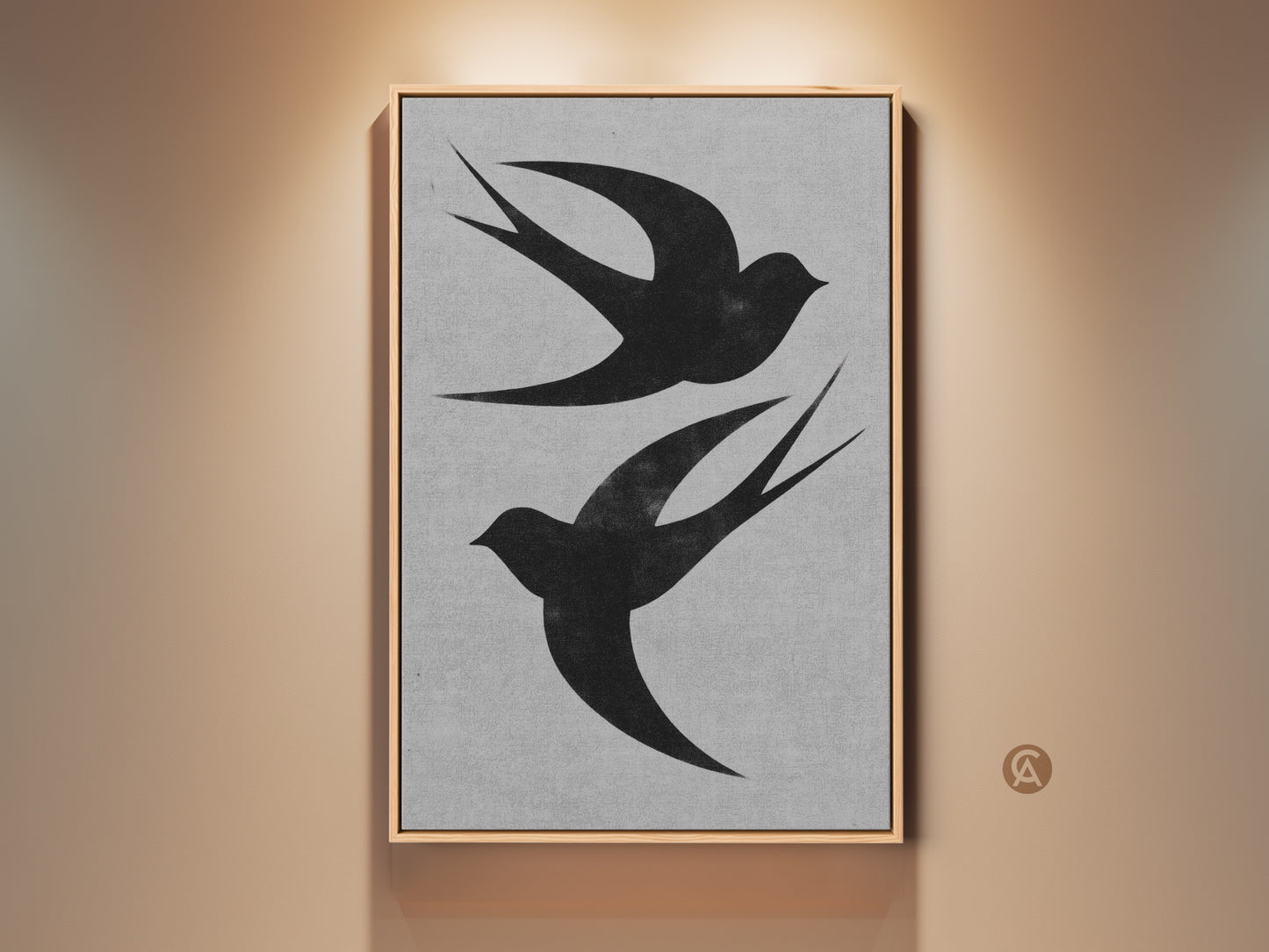 Modern wall art features two black swallows. It is a minimalist bird print against a textured gray backdrop. This nature-inspired canvas art is framed and perfect for home decor or as a housewarming gift. It enhances any room with monochrome elegance.