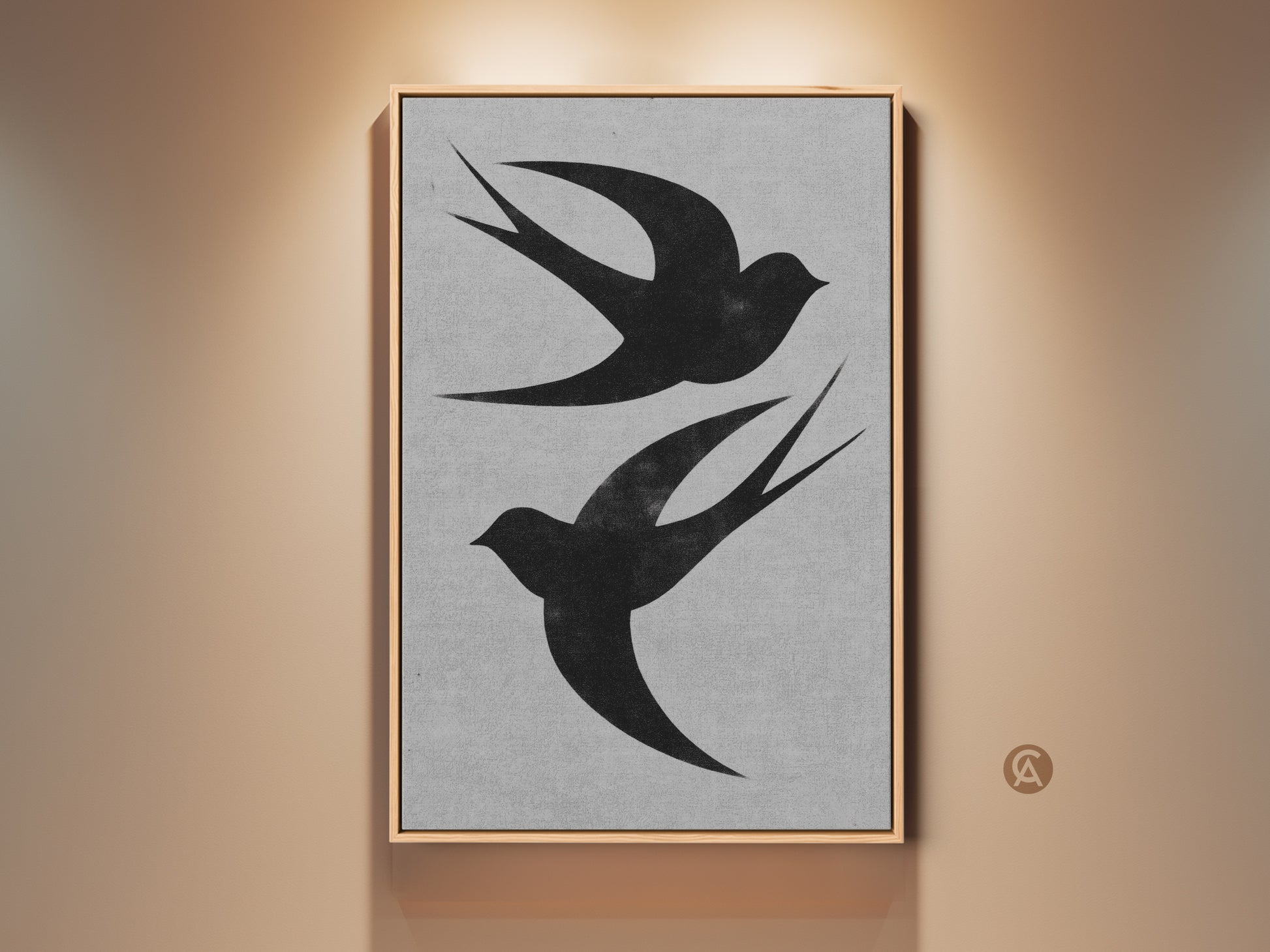 Modern wall art features two black swallows. It is a minimalist bird print against a textured gray backdrop. This nature-inspired canvas art is framed and perfect for home decor or as a housewarming gift. It enhances any room with monochrome elegance.