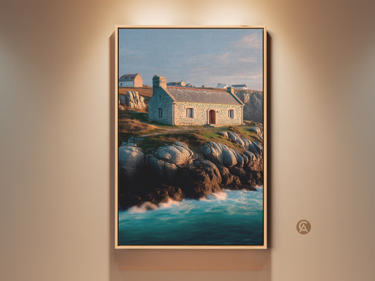 Seaside Stone Cottage wall art print. The coastal art captures a quaint stone house perched on rocky cliffs. Ocean waves crash below in teal and blue tones. Perfect coastal artwork for a serene home decor. A calming realistic seascape canvas print.