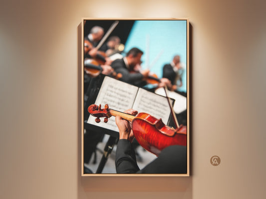 A realistic canvas art print showing an orchestra performance. The artwork captures a close-up view of a musician playing a red violin. This classical music print is ideal for a study room or music room. It makes a thoughtful gift for musicians and music lovers adding artistic depth to any home.