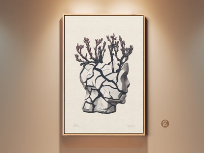 Framed conceptual art print featuring a surreal head sculpture. The artwork displays a branch motif in beige black and gray. It adds an eclectic modern touch to any room. A unique housewarming gift for art lovers. The artwork is displayed in a beige wall environment adding to its aesthetic.