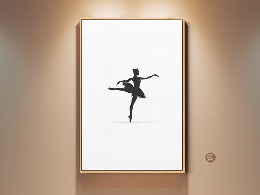 Minimalist black ballerina silhouette art is showcased on a wall. The contemporary artwork is framed in a natural wood tone. It adds a touch of elegance to a bedroom or dance studio. This fine art canvas print is perfect for ballet lovers and art collectors looking for chic wall decor.