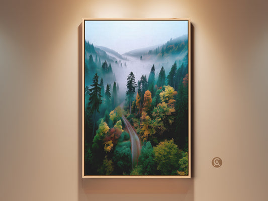 Framed forest artwork. A captivating forest landscape is displayed. The artwork is framed and hung on a wall. The forest is shrouded in mist. There is a path winding through the trees. This framed artwork brings nature's beauty indoors.
