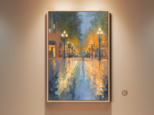 City Street Watercolor Art on display. The artwork shows a rainy urban scene with a person under an umbrella. The colors are vibrant with orange yellow and blue hues. Perfect contemporary wall art for any home decor.