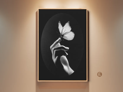 Monochrome butterfly art print. It features a minimalist hand art print. Black and white wall decor is captured. This nature lover gift art brings contemporary elegance. This insect macro print is perfect for elegant home art. Fine art canvas print for a minimalist living room. Consider butterfly wall hanging for modern office art. Makes a great housewarming gift idea. Art for insect collectors