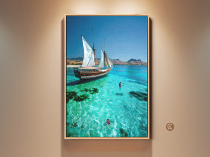 Transform your space with our Coastal Wall Art Sailboat Print. A turquoise ocean scene canvas showcasing beach travel art. This nautical home decor gift captures a majestic sailboat gliding through crystal waters. Swimmers enjoy the refreshing sea bringing coastal beauty to any room. A touch of seaside tranquility.