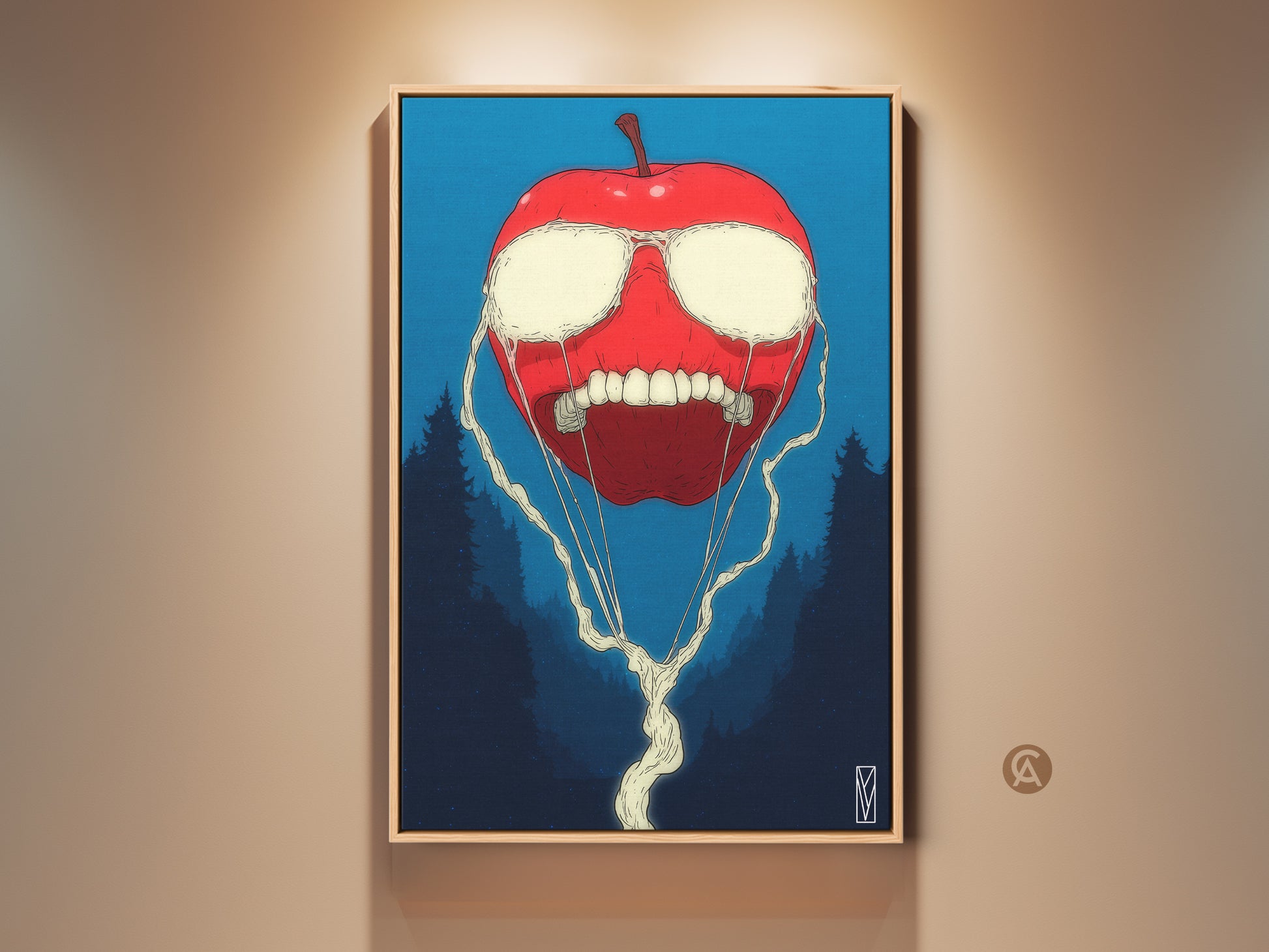 Framed apple artwork hangs on a beige wall. The art features a surreal red apple with white liquid eyes and a toothy grin. Dark trees are in the background. The frame is a light natural wood tone.