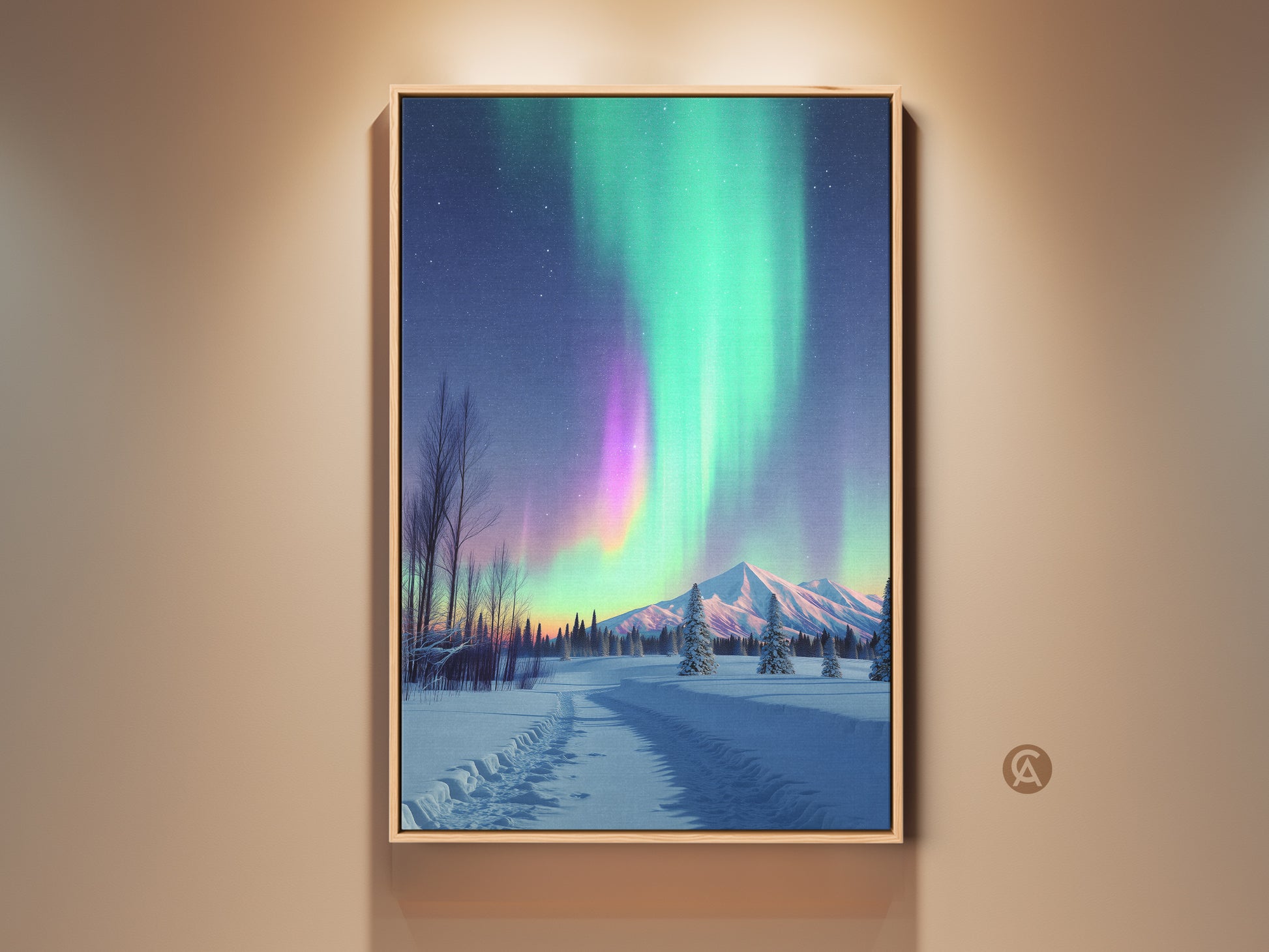Framed Northern Lights canvas artwork hangs on a beige wall. Aurora Borealis illuminates a winter landscape with snow-covered mountains. This green and purple sky art is a beautiful nature scene. Perfect wall decor for adding a peaceful outdoor view to any room.