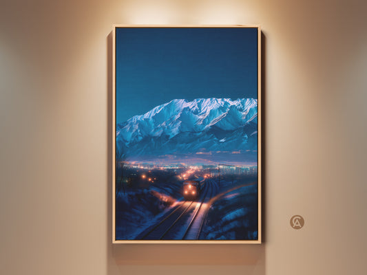 A framed canvas print showcases indigo mountains. A train approaches a cityscape at night. The blue and orange landscape artwork enhances home decor. It's a contemporary travel themed gift. The premium canvas captures winter magic.