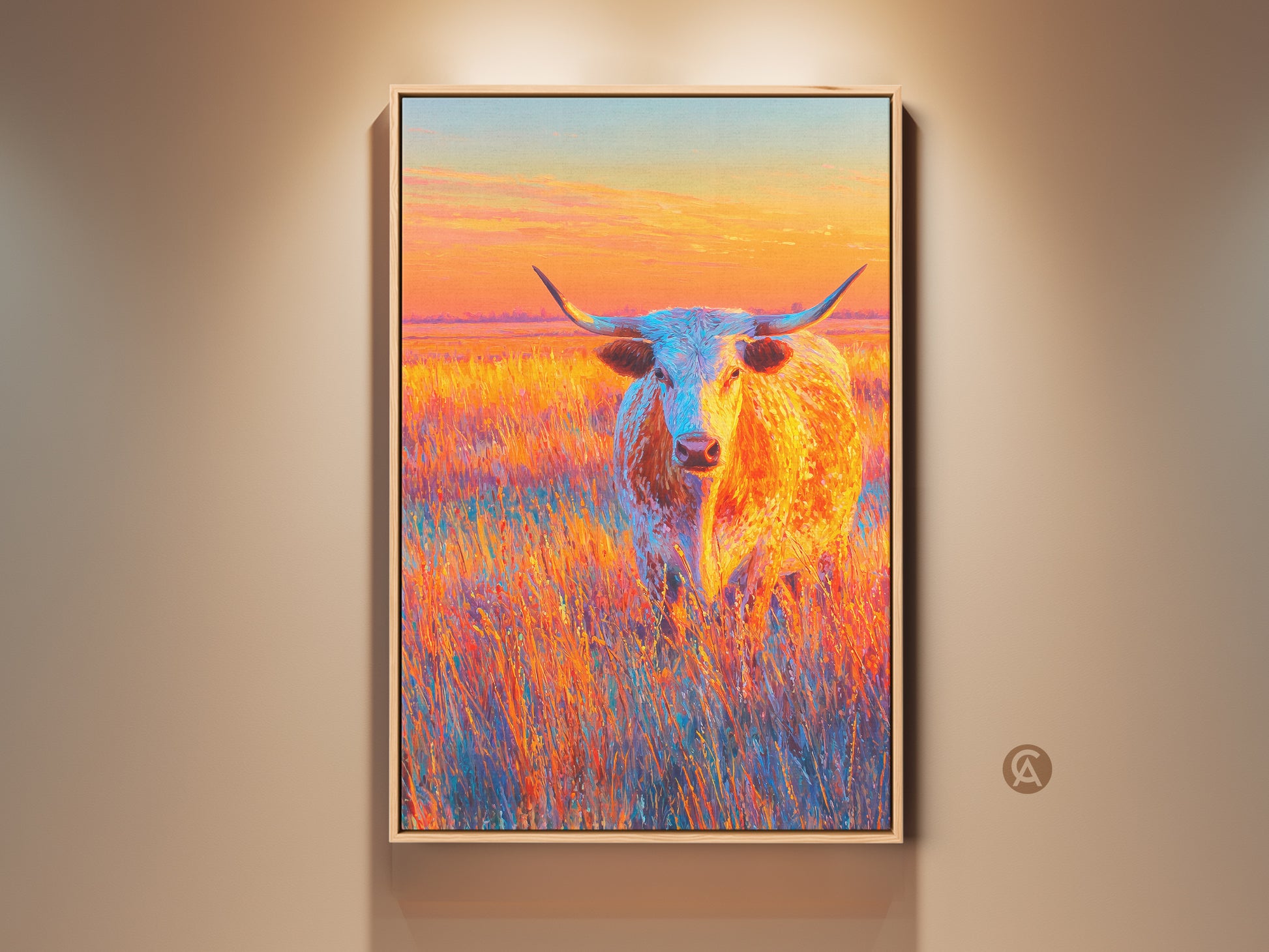 Vibrant longhorn art print. This artwork captures a Texas longhorn standing in a field. The sky features warm hues of orange and pink. This gallery wrapped canvas adds a touch of western charm to any space.