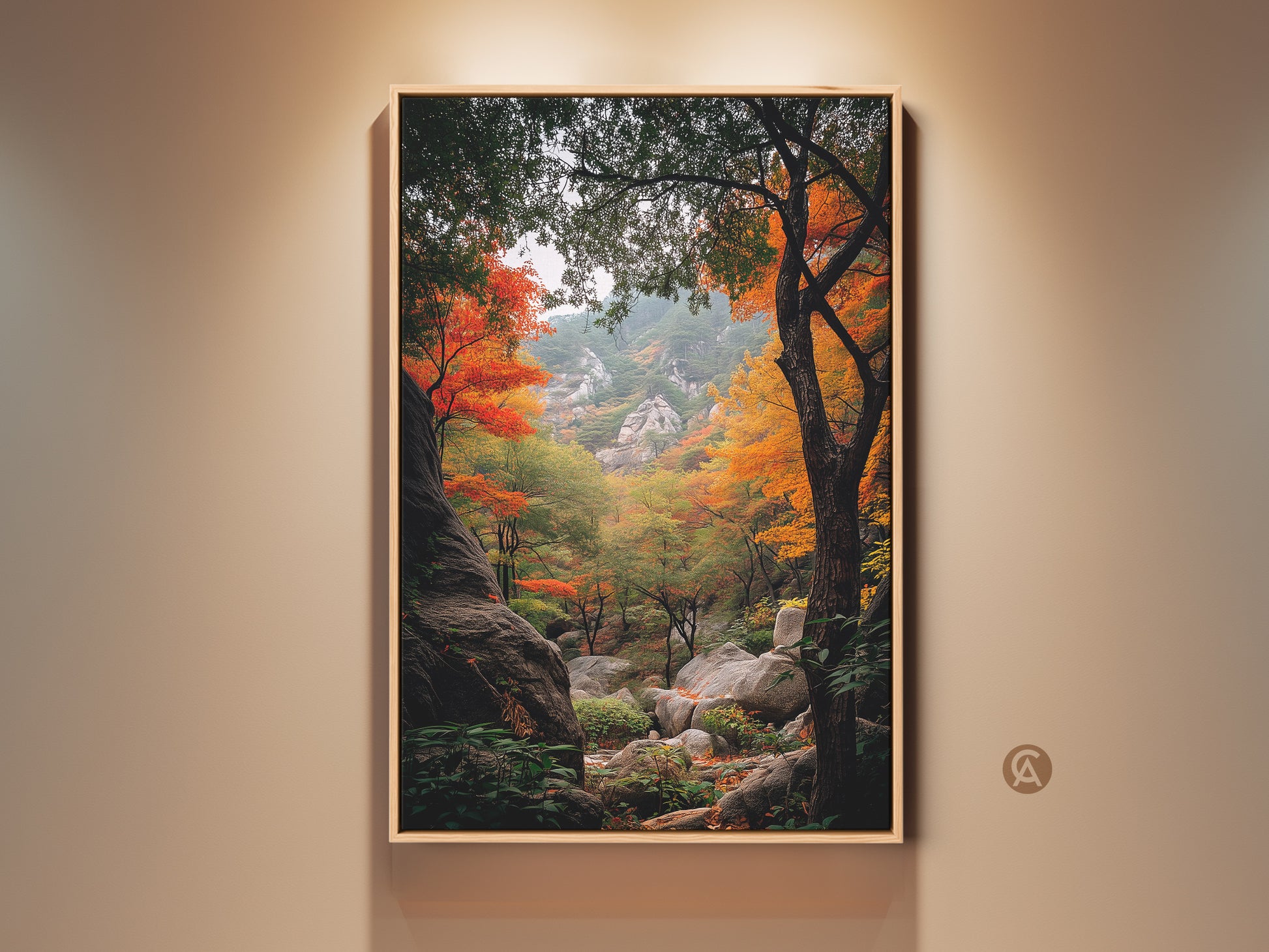 Framed landscape art featuring a vibrant autumn forest scene. The artwork showcases colorful trees and rocky terrain. The frame accentuates the natural beauty of the landscape. This wall art brings nature's splendor indoors. Perfect for adding a touch of fall to any room.