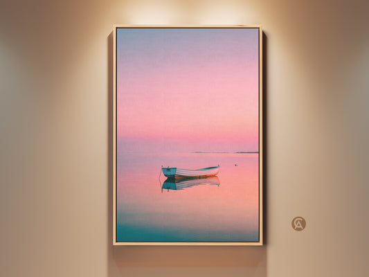 Framed boat artwork on a wall. The artwork features a pastel sunset and a boat in the water. Soft lighting highlights the piece. Perfect wall art for a calming atmosphere. Shop framed canvas art now.