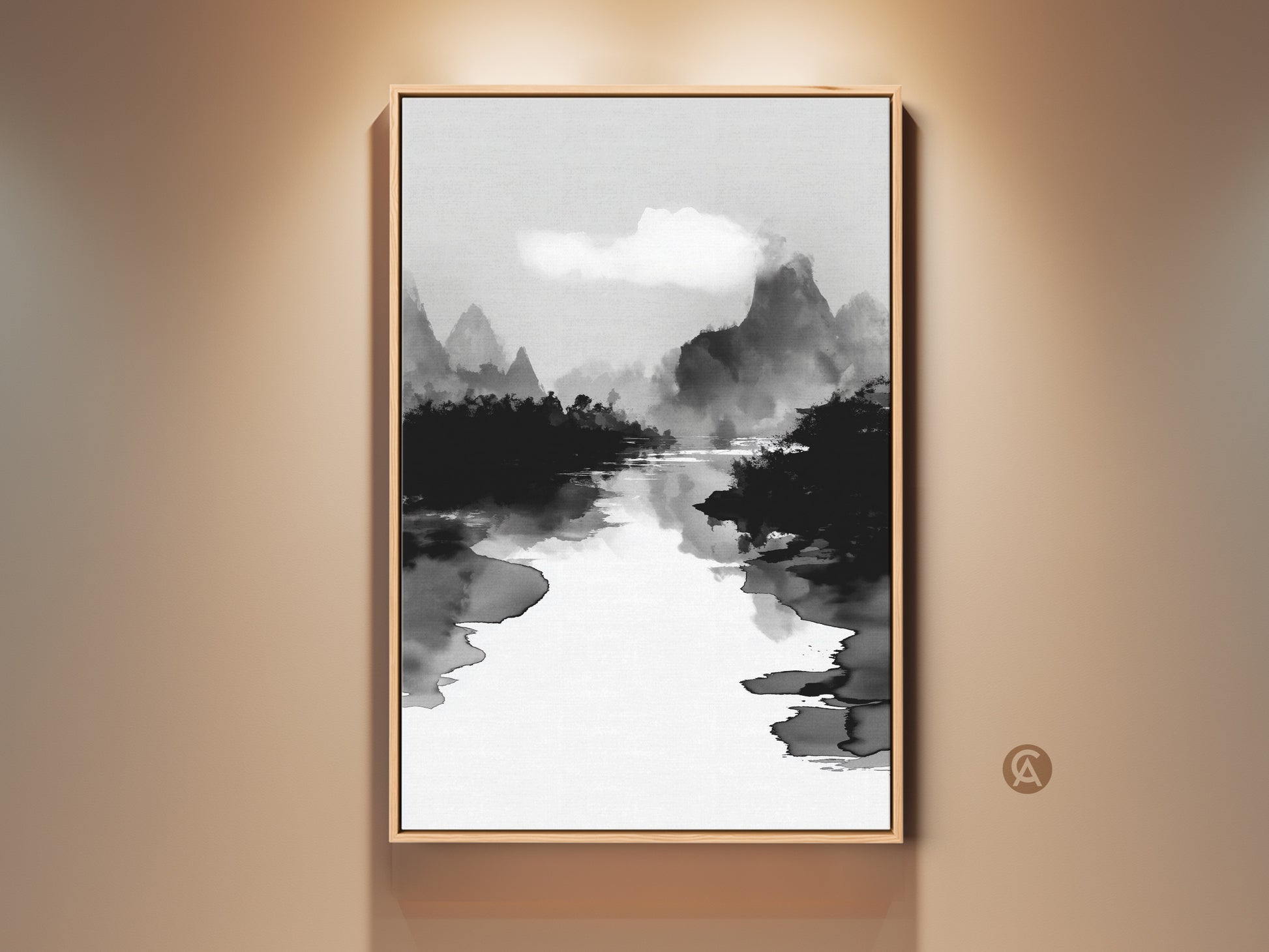 Framed black white ink wash art print on a beige wall. This mountain river landscape canvas adds minimalist nature wall decor to any space. The Japanese Sumi-e style artwork brings a calm aesthetic to your home or office. This fine art print enhances your room's ambiance with its serene monochrome beauty.