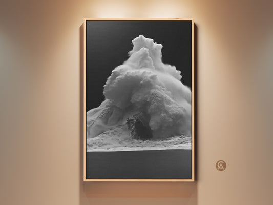 Monochrome ocean wave canvas art in a wood frame. A black and white ocean print for coastal home decor. The contemporary sea spray artwork brings a touch of the surfer beach to your walls. Ideal for a modern living room or home office. A perfect housewarming gift for beach lovers.