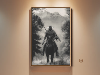 Rustic monochrome canvas art print featuring a cowboy on horseback. This Western landscape artwork is perfect for a study room or home office. The black and white tones add a vintage Western decor touch. It's an ideal gift for Western fans seeking adventure themed artwork.
