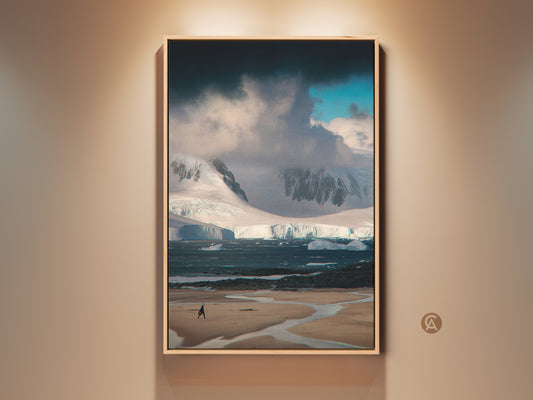 Antarctica Landscape Photography displayed in a oak frame. A minimalist Iceberg wall art. Blue and white nature decor bringing the Arctic to your contemporary home. Man walking on the shore