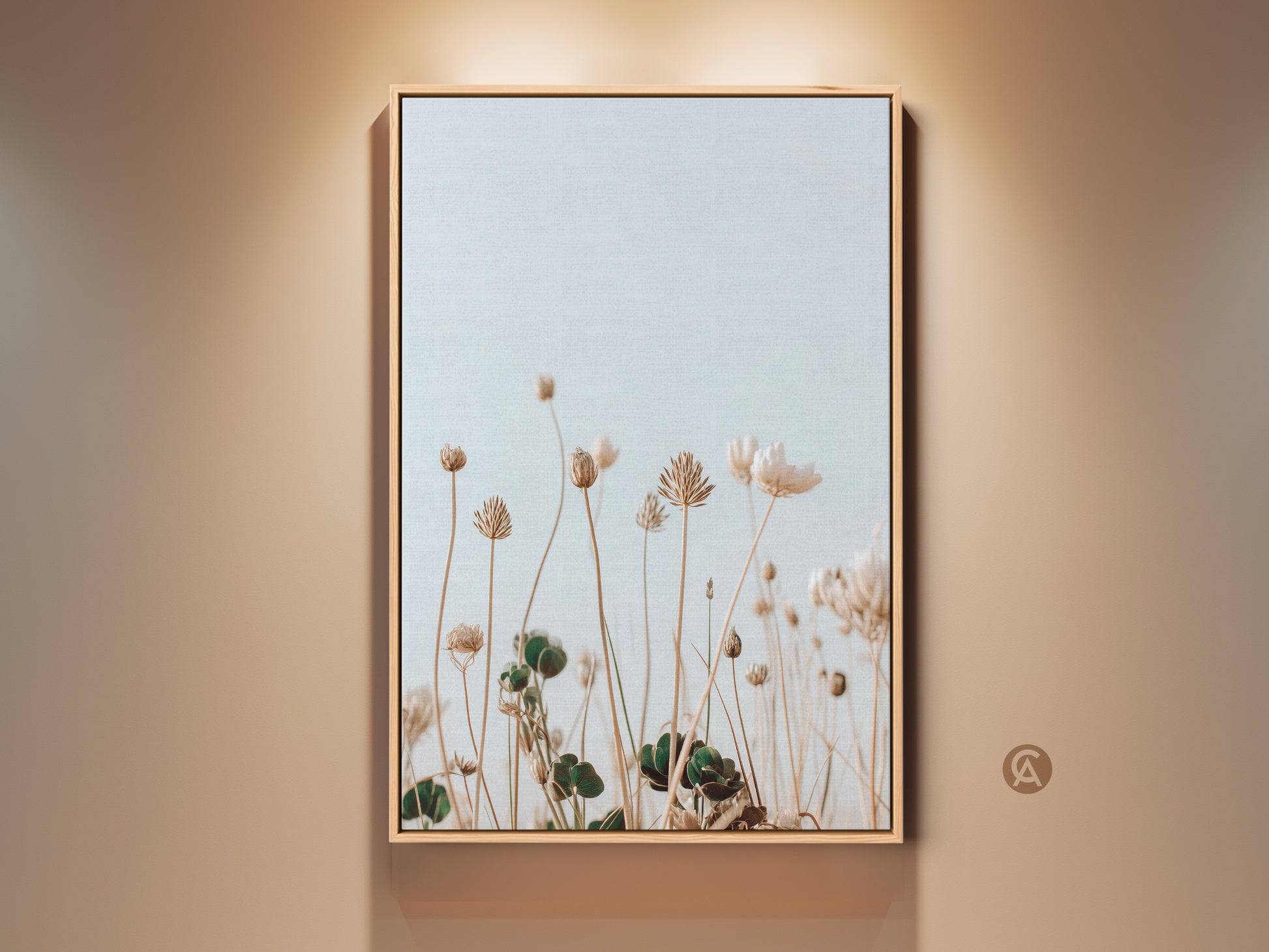 Framed boho wildflower art print in cream and light blue tones. The minimalist floral artwork enhances bedroom decor. A serene botanical piece brings nature indoors. Perfect as a housewarming gift for plant lovers.  It is ideal for minimalist interiors. This canvas print adds a delicate artistic touch to residential spaces.