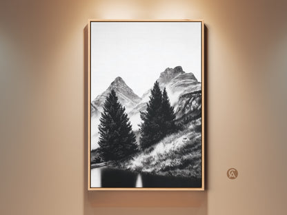 Monochrome landscape wall art featuring a minimalist mountain and pine tree scene. This framed canvas print showcases a black and white nature artwork perfect for cozy home decor. The oak frame enhances the natural scenery art adding a touch of rustic charm.