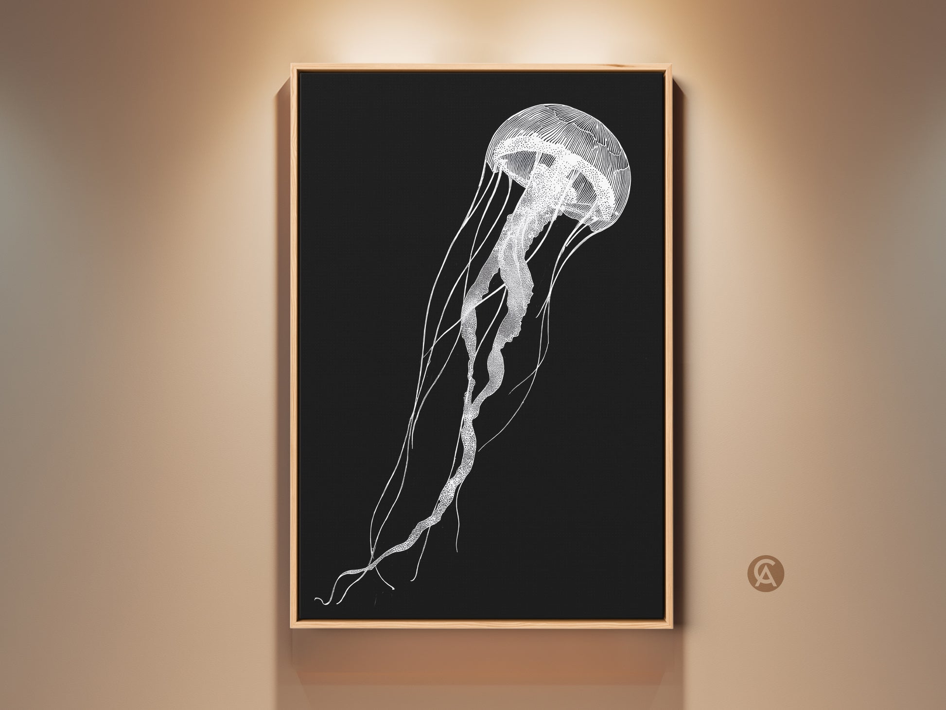 A framed minimalist jellyfish art print hangs on a light beige wall. The black and white line artwork adds contemporary elegance to any room. This ocean sea life wall decor is perfect for coastal living.