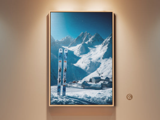Framed ski art print. A winter mountain scene artwork. The snow covered mountains are beautiful. Skis stand in the snow. This ski art is perfect for ski lovers. Buy this framed canvas art today.