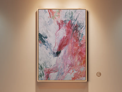 Gallery view of an expressive abstract horse canvas art print. The artwork features a dynamic blend of coral teal and pink hues. This eclectic animal art piece is a perfect gift for horse lovers. The canvas is framed in a natural wood tone enhancing its vibrant colors and making it a focal point for any room.