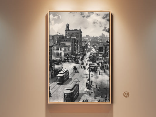 Step back in time with this vintage city street artwork. Trolleys and horse-drawn carriages share the road. A tall building rises in the background under a cloudy sky. This framed artwork adds a touch of history to any room.