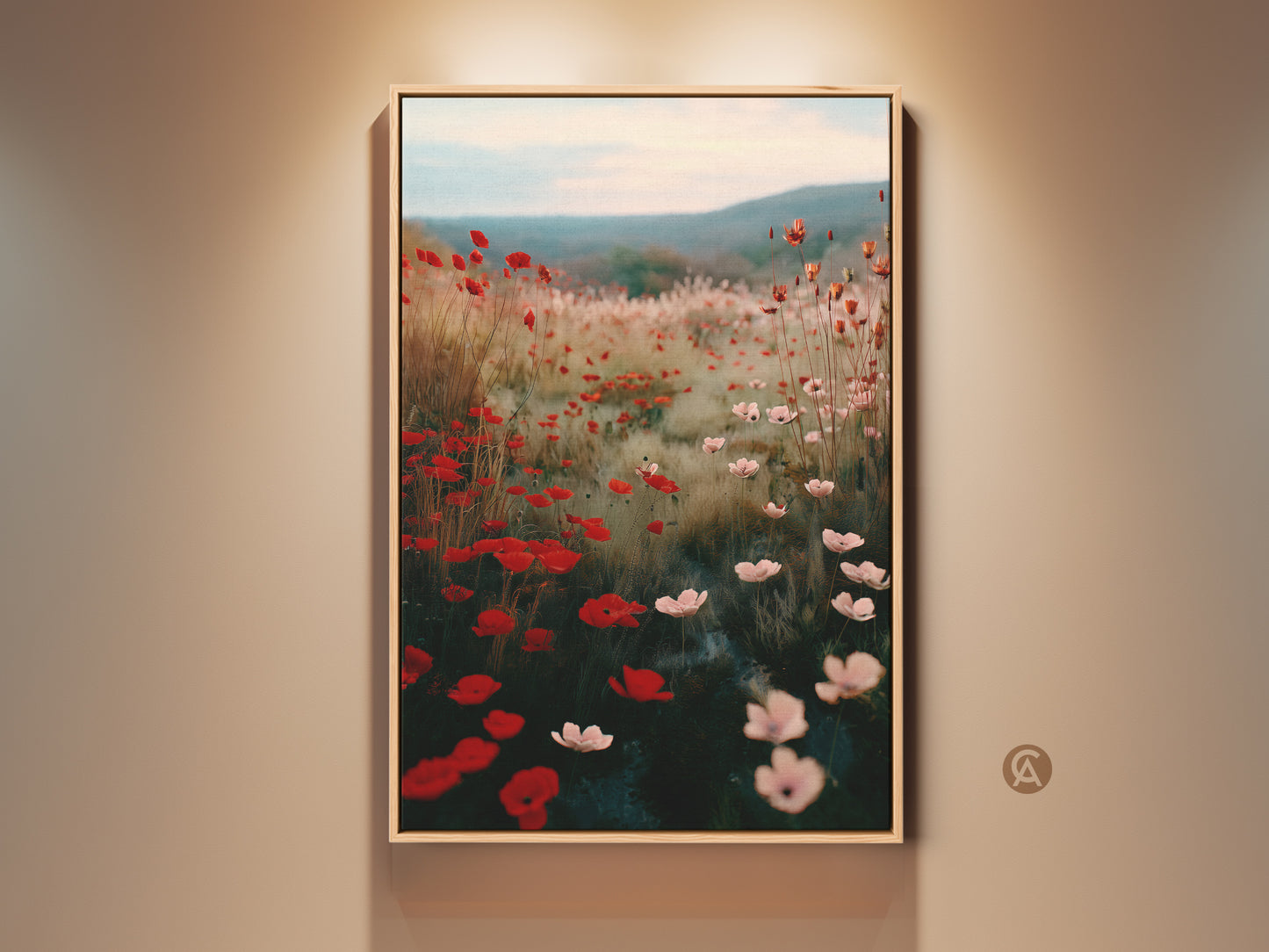 Crimson Red Poppy Field art print displayed in a room setting. The impressionistic floral landscape canvas adds a touch of Boho charm. This nature lovers gift idea presents soft pink wildflowers in a dreamy scene. Perfect botanical art for a living room or entryway floral canvas.