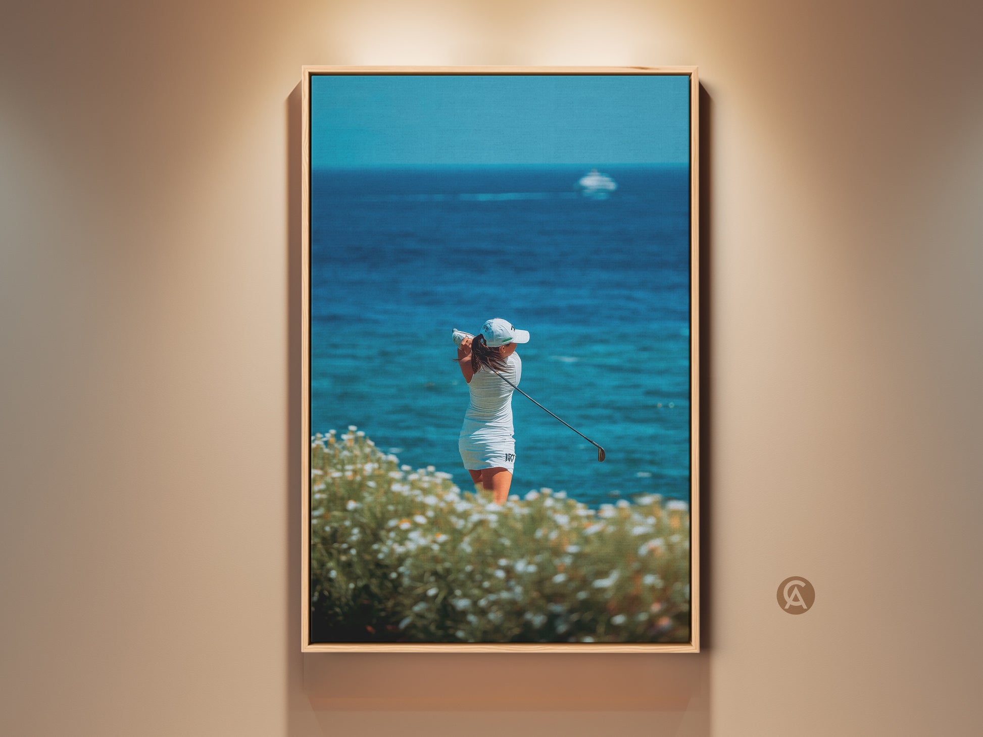 Woman golfer art on canvas. This artwork captures a female golfer in action. She is swinging her club against a backdrop of a beautiful blue ocean view. The artwork is framed and ready to hang adding a touch of elegance to any space.