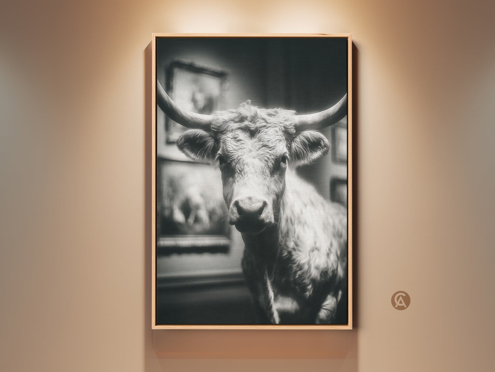 Framed black and white photograph of a Texas Longhorn bull. The artwork features a close-up of the bull's face and horns. The photo is matted and framed. A perfect piece for western decor. Add a touch of rustic charm to your home with this stunning animal art.
