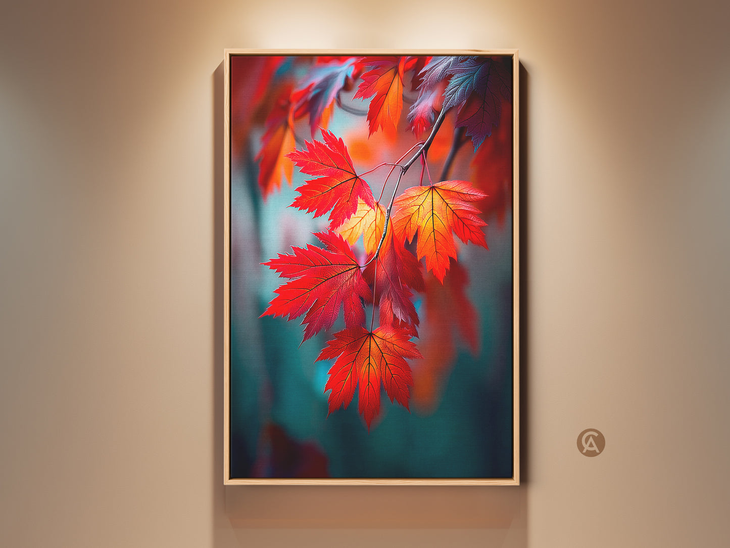 Framed maple leaf artwork with vibrant fall colors displayed in a tan room. The wall art is in a floating frame. This colorful botanical art print adds warmth to any space.