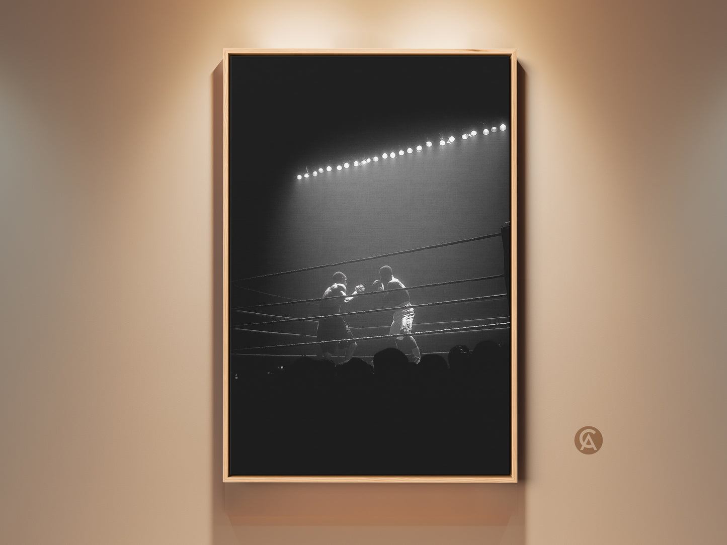 Dramatic black and white boxing match artwork hangs in a spotlight lit room. This sports photography print brings industrial style to man caves and offices. A unique gift for fighter fans.