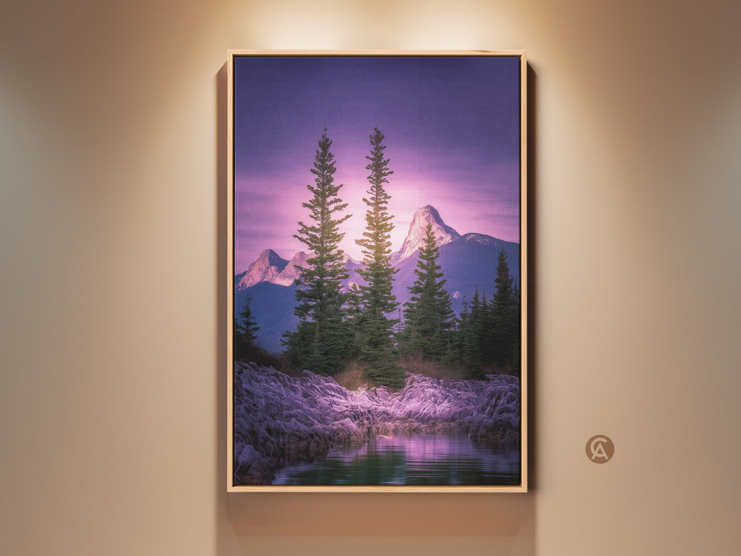 Framed pine tree mountain art print. Violet and green landscape canvas in a wood frame. Rocky shoreline wall decor for a bedroom. Nature artwork brings a serene mountain view indoors.