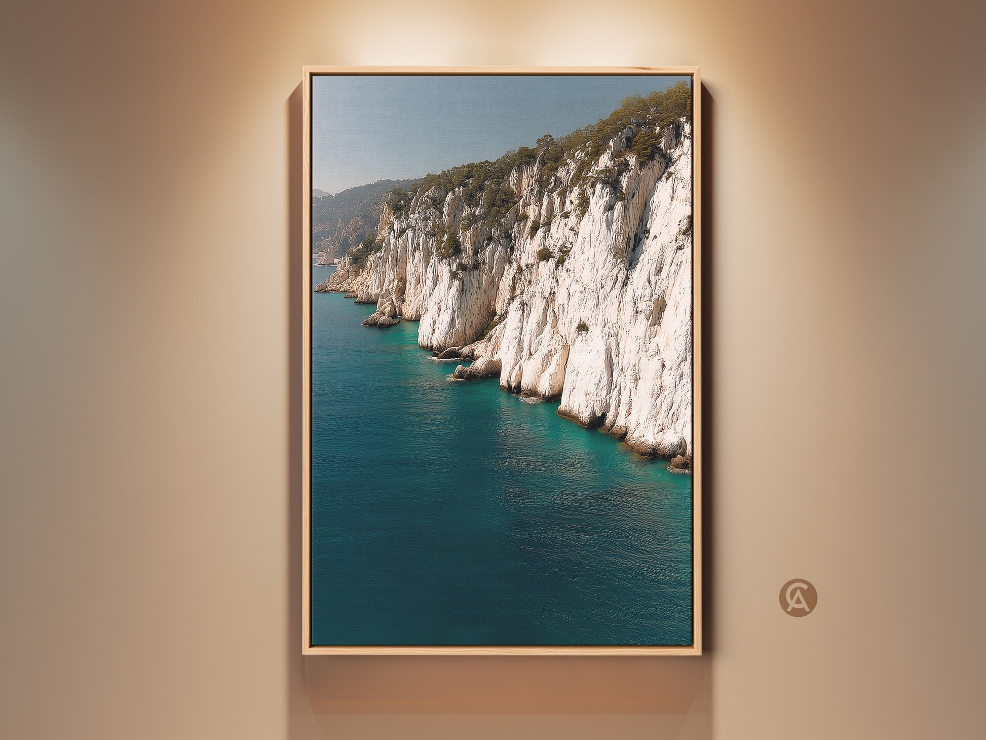 Gallery view of ocean cliff canvas artwork. This coastal landscape photography features blue teal water and white cliffs. A perfect beach lover gift this realistic nature artwork enhances any space.