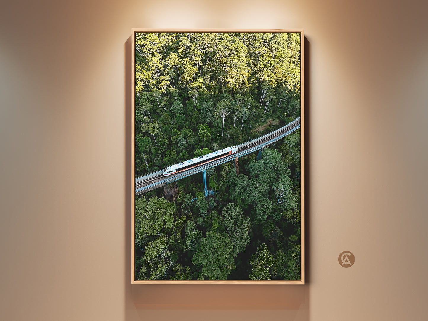 Aerial forest train art print showcases modern green landscape canvas. This transportation photography captures nature wall decor. Ideal travel gift for art lovers. Contemporary artwork featuring a railway bridge over lush greenery. A unique overhead forest view perfect for any space.