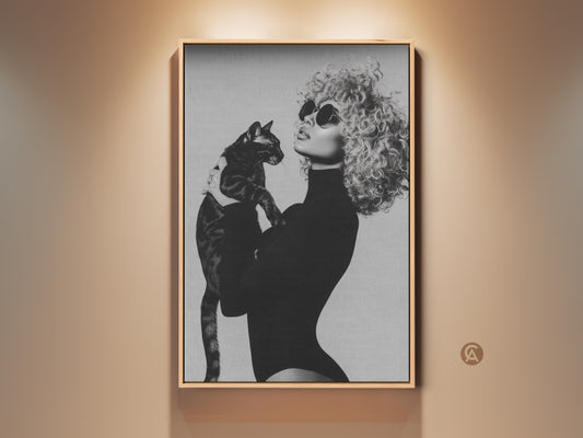 Monochrome fashion art print featuring a woman with a cat. This glamour canvas wall decor in black and white adds elegance to any room. A chic gift for cat moms offering a contemporary touch to home decor. The framed artwork is ready to hang making it a stylish addition to your living space.
