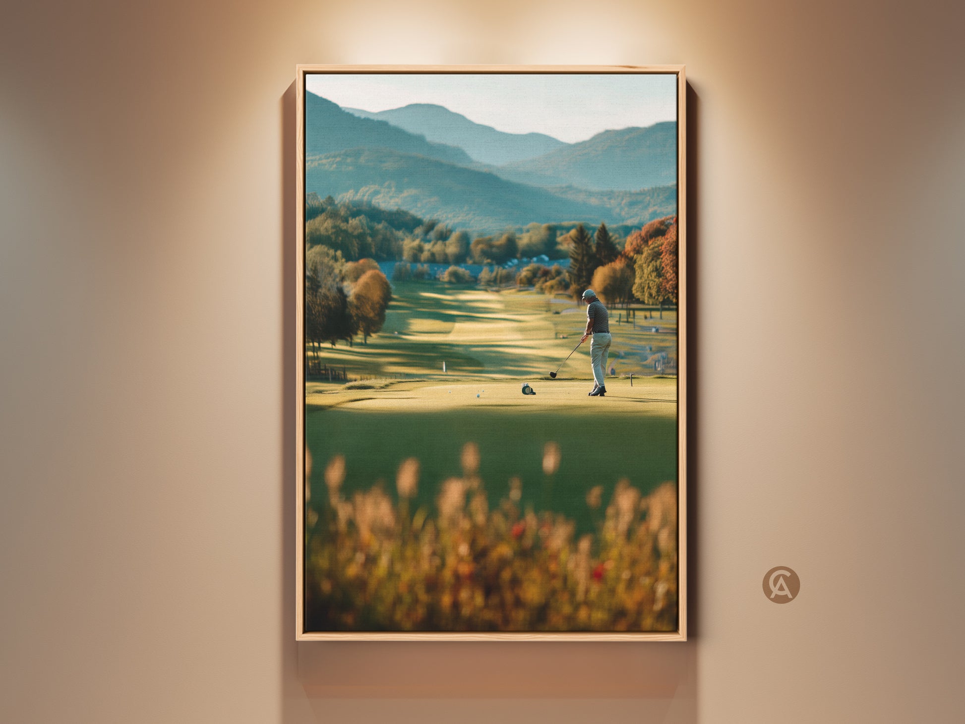 Experience the beauty of golf with this golf course artwork. A golfer prepares to tee off on a lush green course framed by mountains. Perfect for adding a touch of sporty elegance to any space. The artwork is displayed in a oak floating frame.