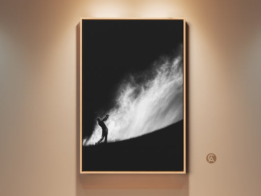 Dramatic black and white golf art print. This framed artwork captures a golfer silhouetted against a striking cloudy sky. The fine art print is perfect for golf enthusiasts. It adds a touch of sophistication to any space.