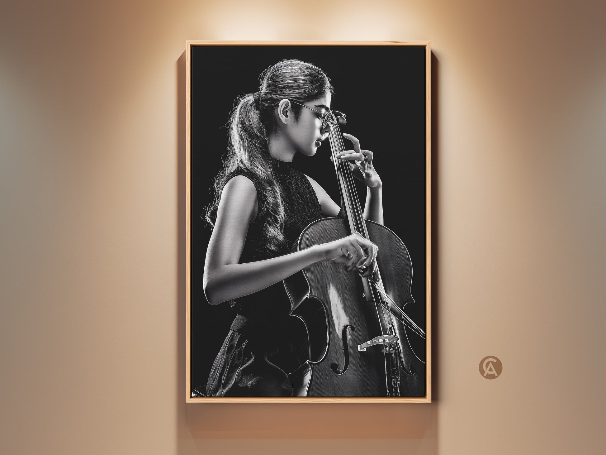 Framed monochrome photograph showcases a cellist. The musician plays in a dark studio. This contemporary black and white art print is framed. It is a perfect gift for music enthusiasts and classical art collectors.