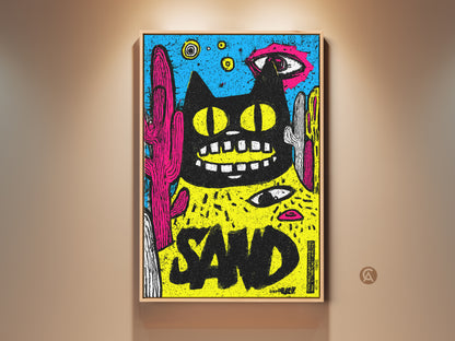Framed colorful wall art of a black cat. The cat has yellow eyes and is surrounded by cacti. The artwork is mounted on a beige wall. A modern art piece brings a playful vibe to any room.