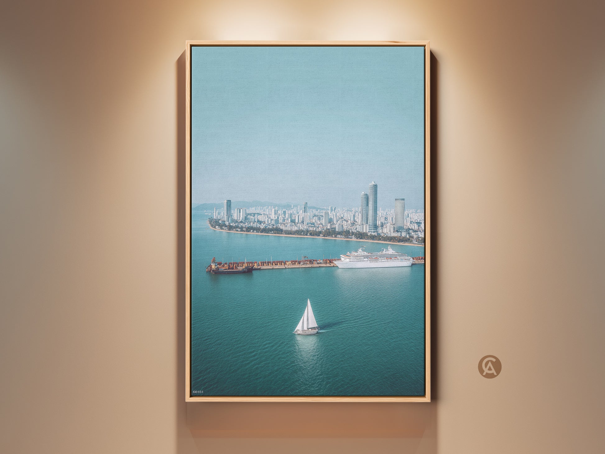 Ocean Cityscape Aerial Art Print in a wood frame. Features a sailboat cruise ship wall decor in a blue teal modern photography style. Perfect travel lover gift and wall art.