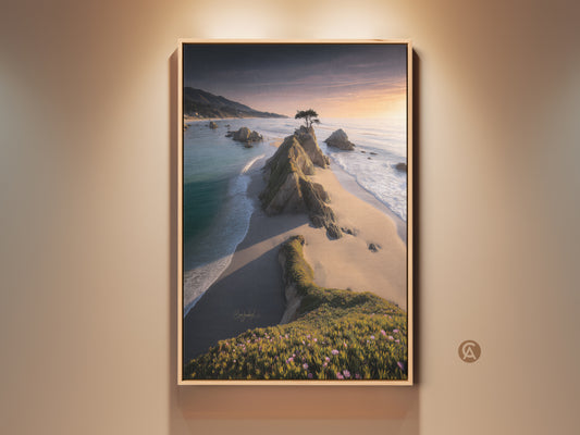 Framed beach sunset canvas art featuring a lone tree on a rocky coast. This coastal landscape print captures the golden hour with teal ocean hues. Perfect as serene home decor. A captivating housewarming gift art for beach lovers. The scenic nature print brings coastal beauty indoors.