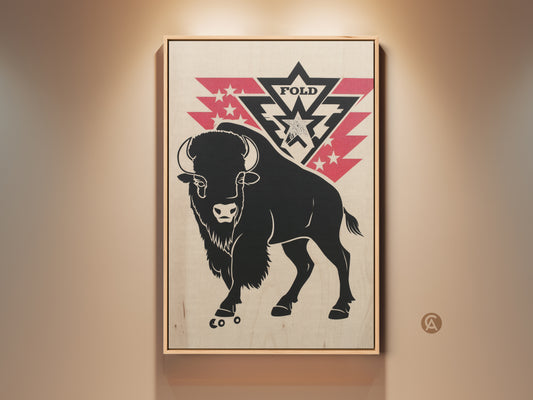 Rustic bison canvas art hangs on a beige wall. This wildlife wall print features a black bison silhouette. Red retro stars decorate the background. A great nature lover gift for a den or office space.