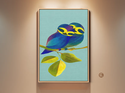 A vibrant bird couple canvas print adds a touch of contemporary charm to any wall. Teal and yellow hues create a soothing yet striking nature-inspired piece. Perfect gift for animal lovers seeking Scandinavian style decor for their home or office. The artwork features a blue bird couple with yellow beaks on a branch with leaves.